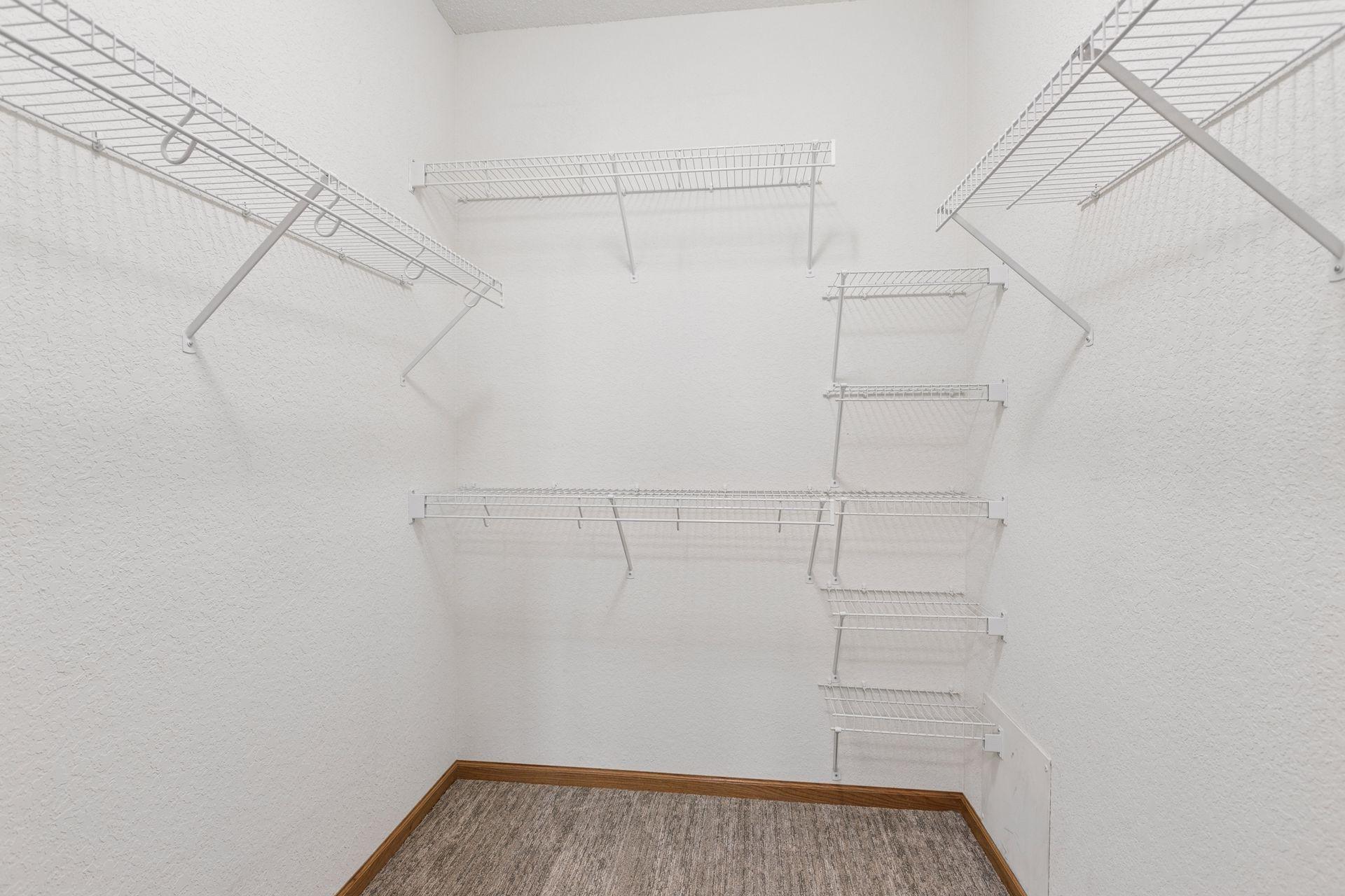 large walk- in closet in the primary bedroom