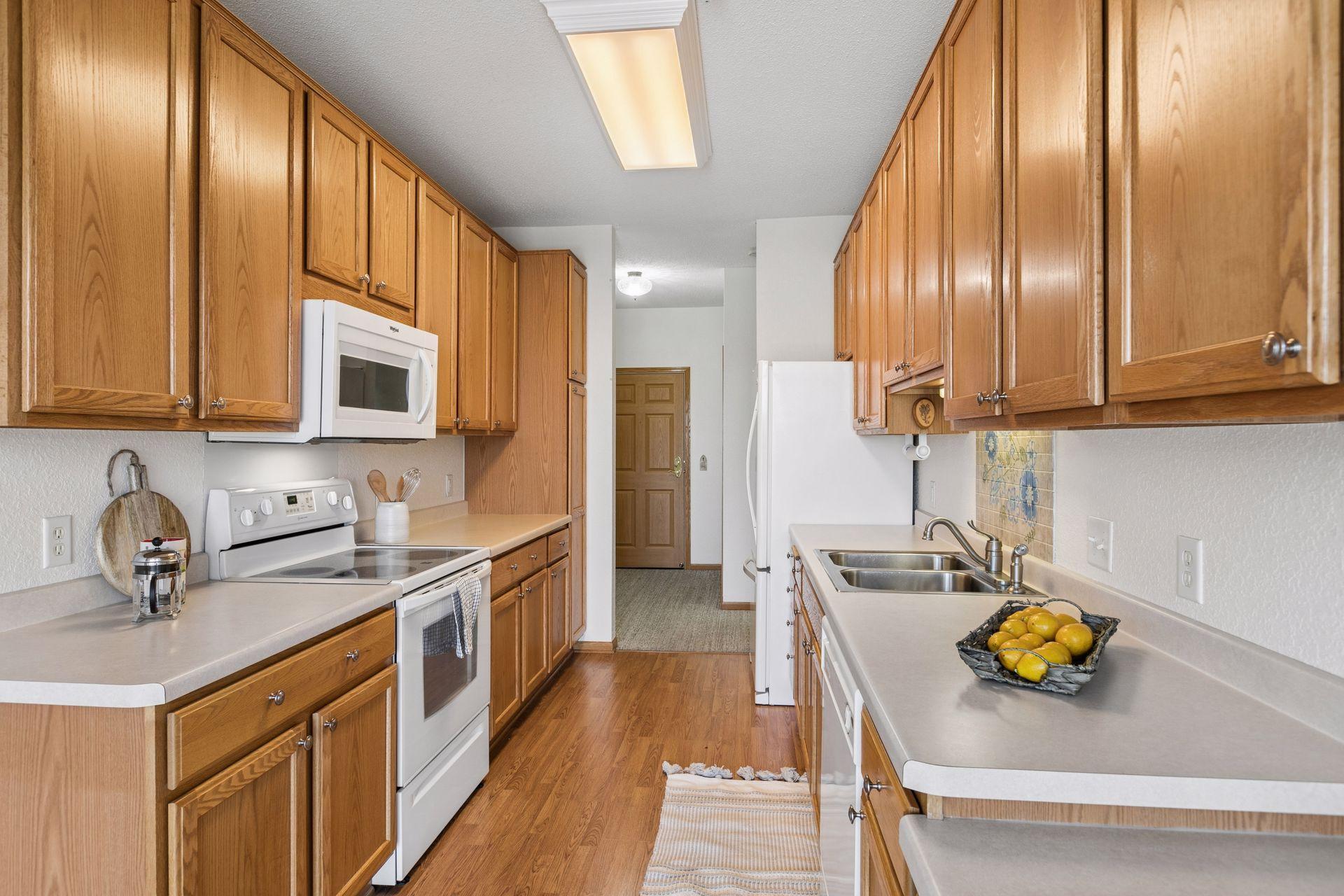 The kitchen has plenty of counter space and storage!