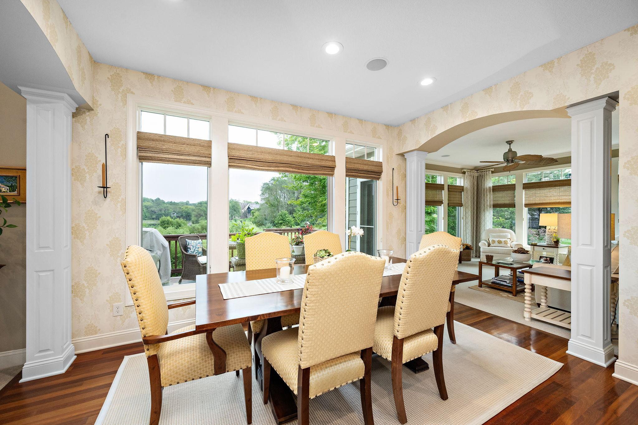 spacious eat-in kitchen overlooking ponds and treetops