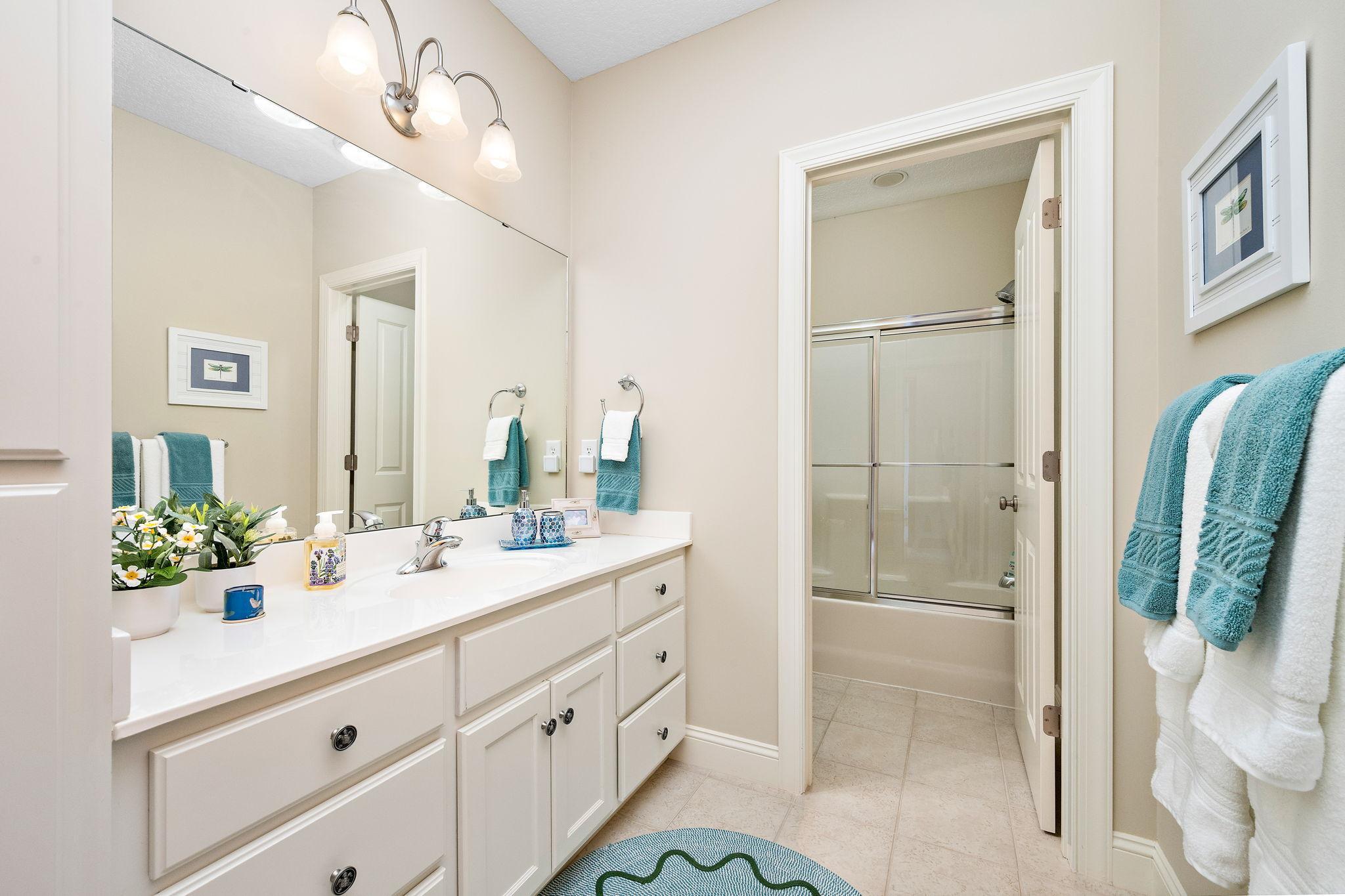 lower level full bathroom - between bedroom 3&4