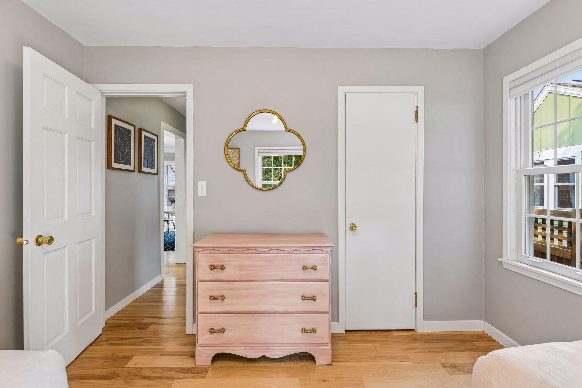 Pull-down blinds in both bedrooms and bath on main level.