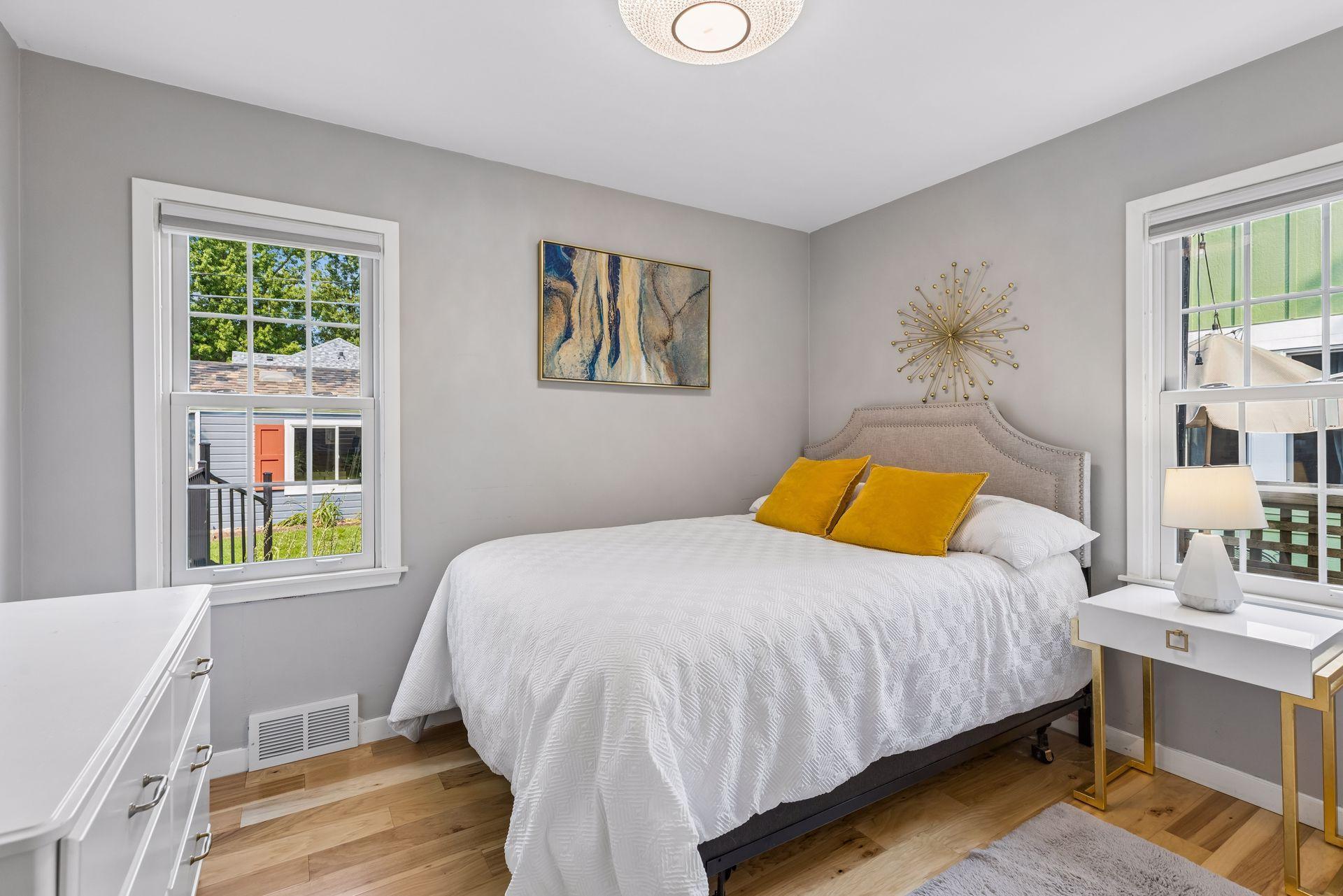 Second bedroom on the main level overlooks the backyard.