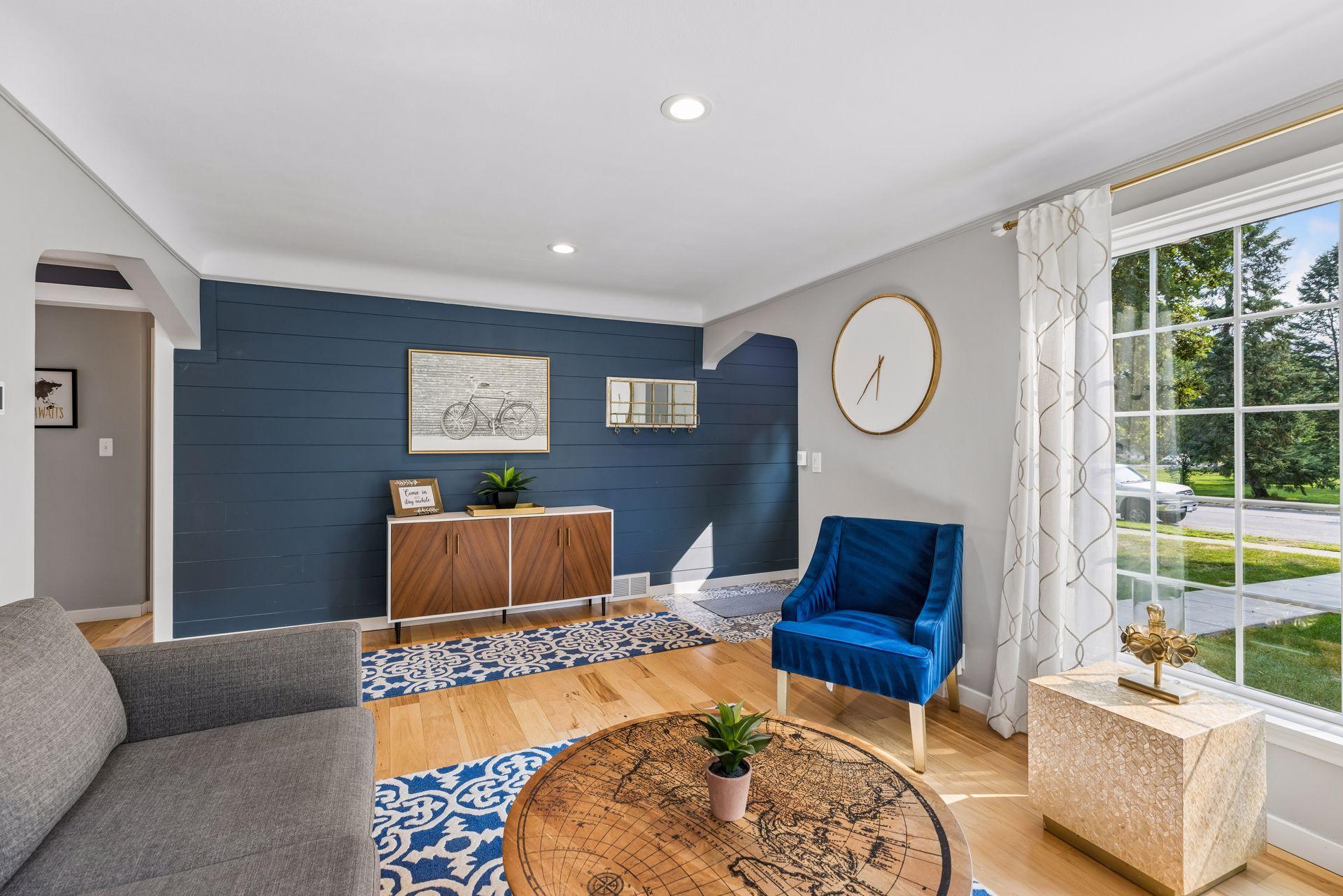 Park views across the street, and shiplap accent wall.