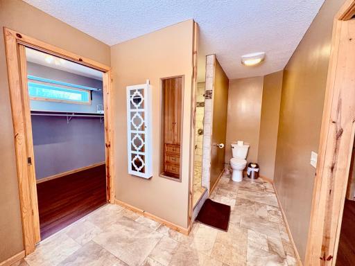 Master bath with large walk in closet
