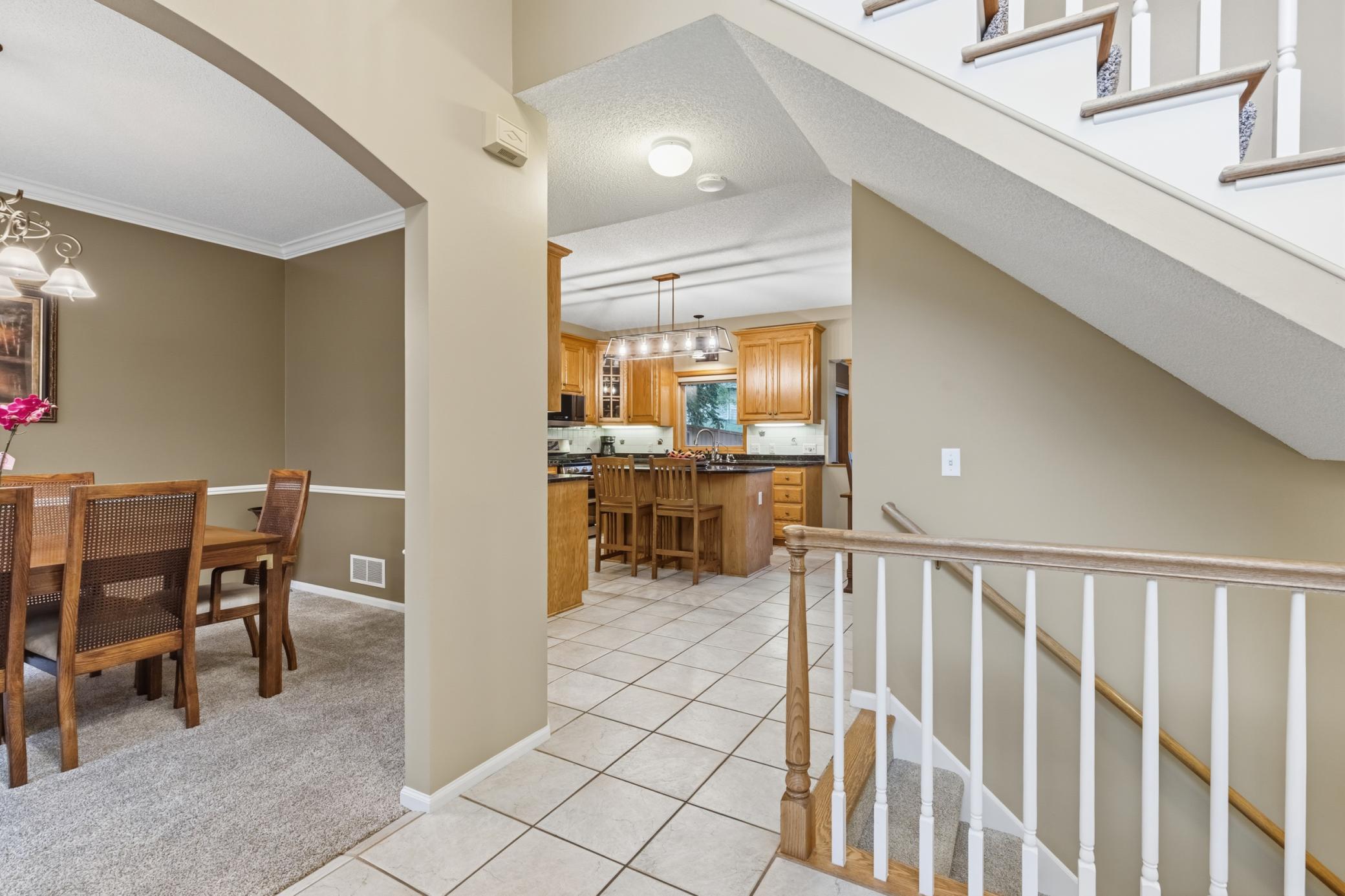 Beautiful tiles in the entry leading to the kitchen/informal dining area.