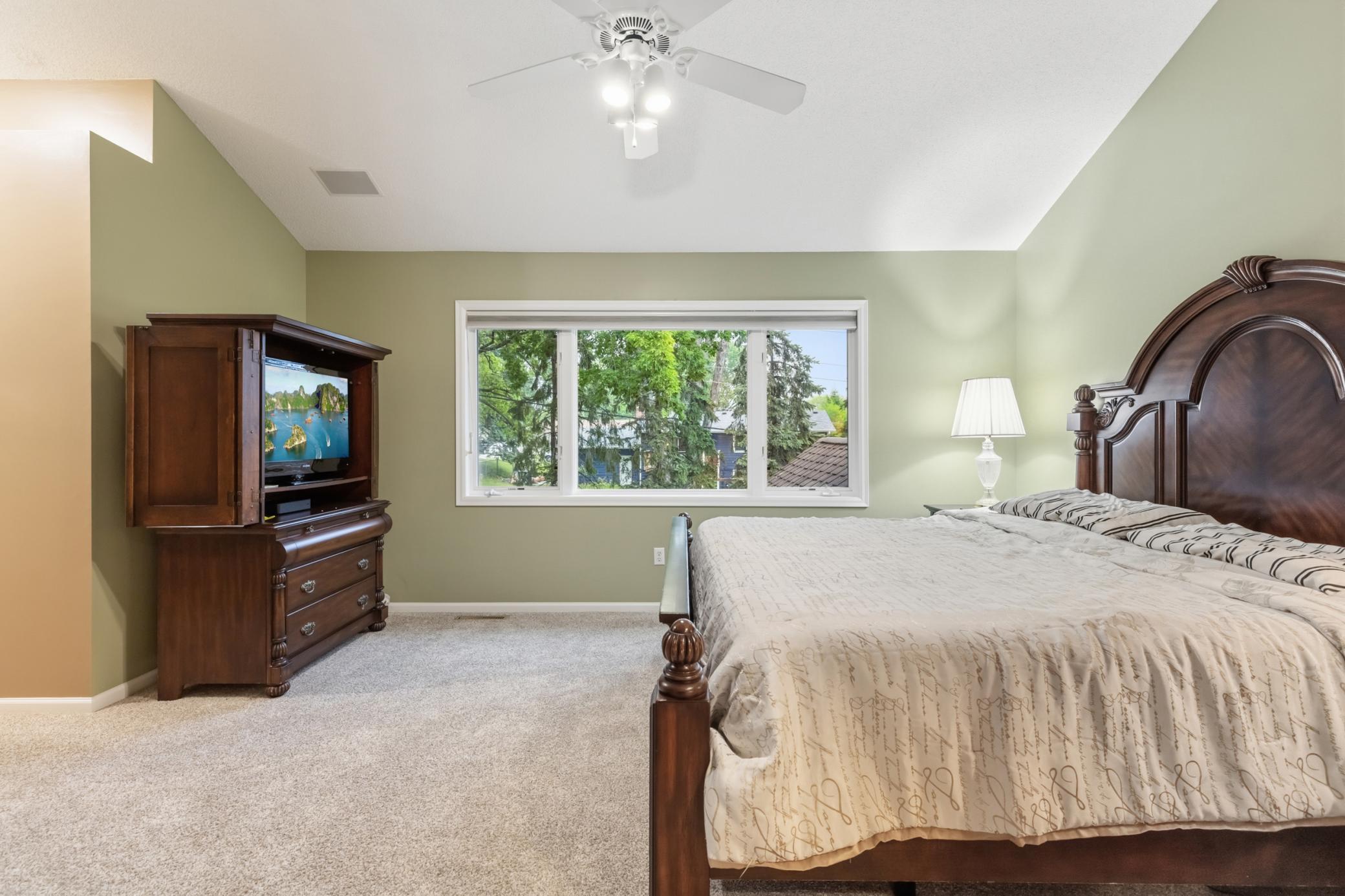 Another view of the primary bedroom