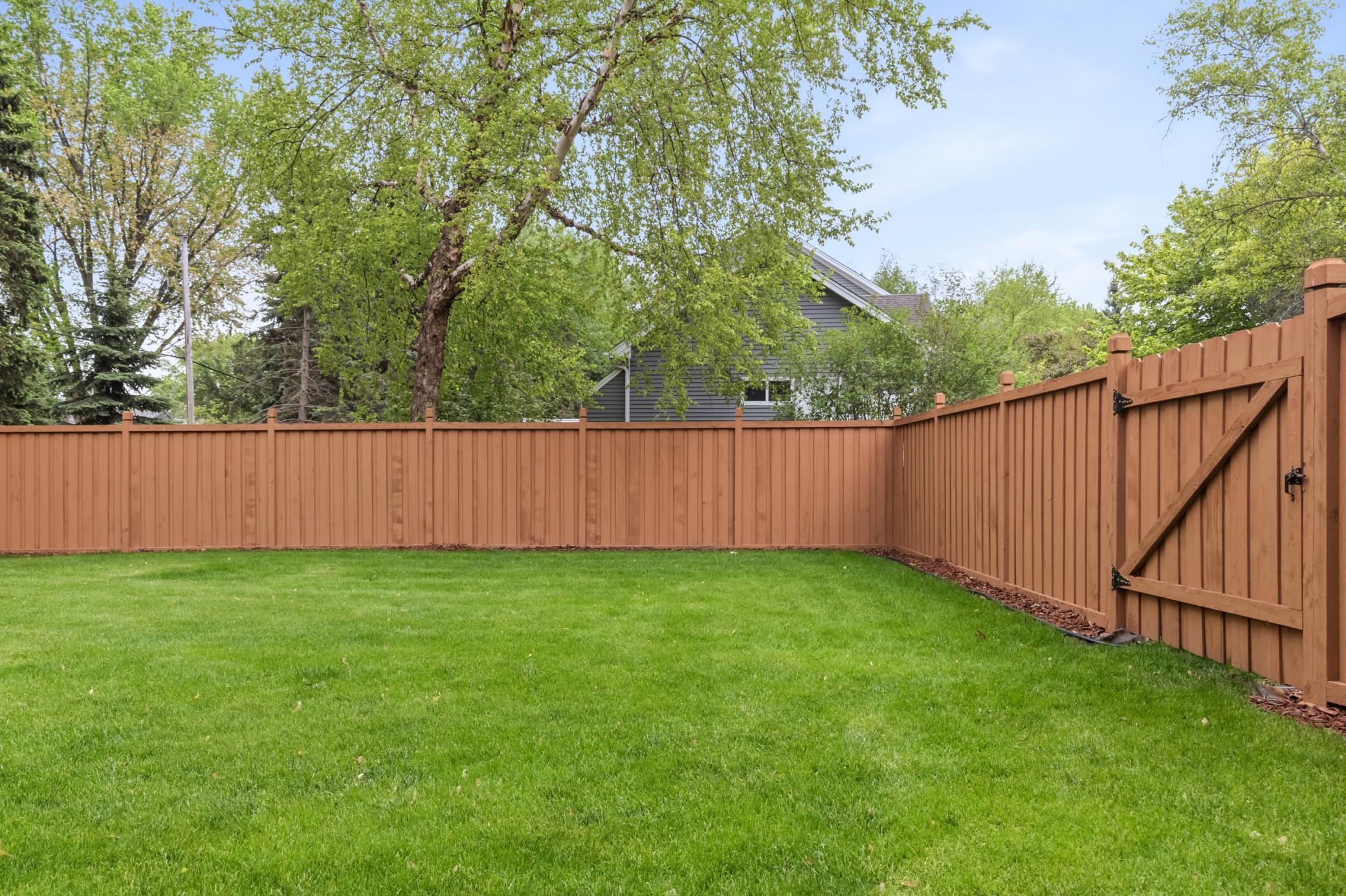 Private backyard/side yard. Fully fenced in with two gates located in either side of the house.