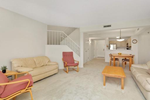 Living Room with stairs to second level.