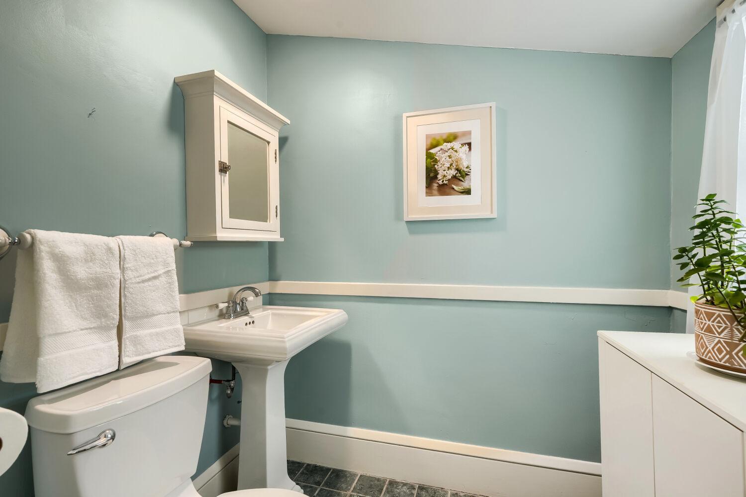 Primary suite half bathroom