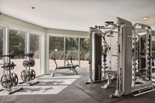 The exercise room has great natural light and a variety of equipment