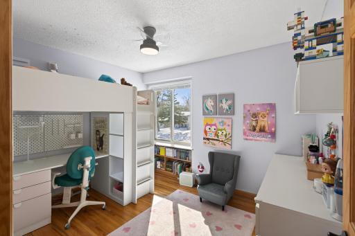 Bedroom 1 (upstairs) filled with light and cute built-ins