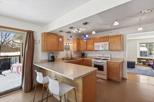 Such fun and unique lighting in this spacious kitchen