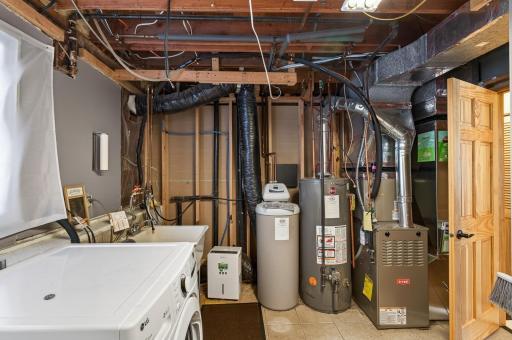 Utility room with newer furnace (2020)