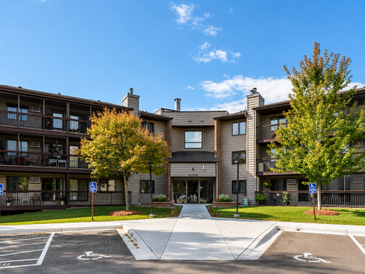 Welcome to this beautifully maintained condo community, featuring contemporary architecture, manicured green space, a secure main entry, and convenient front parking.