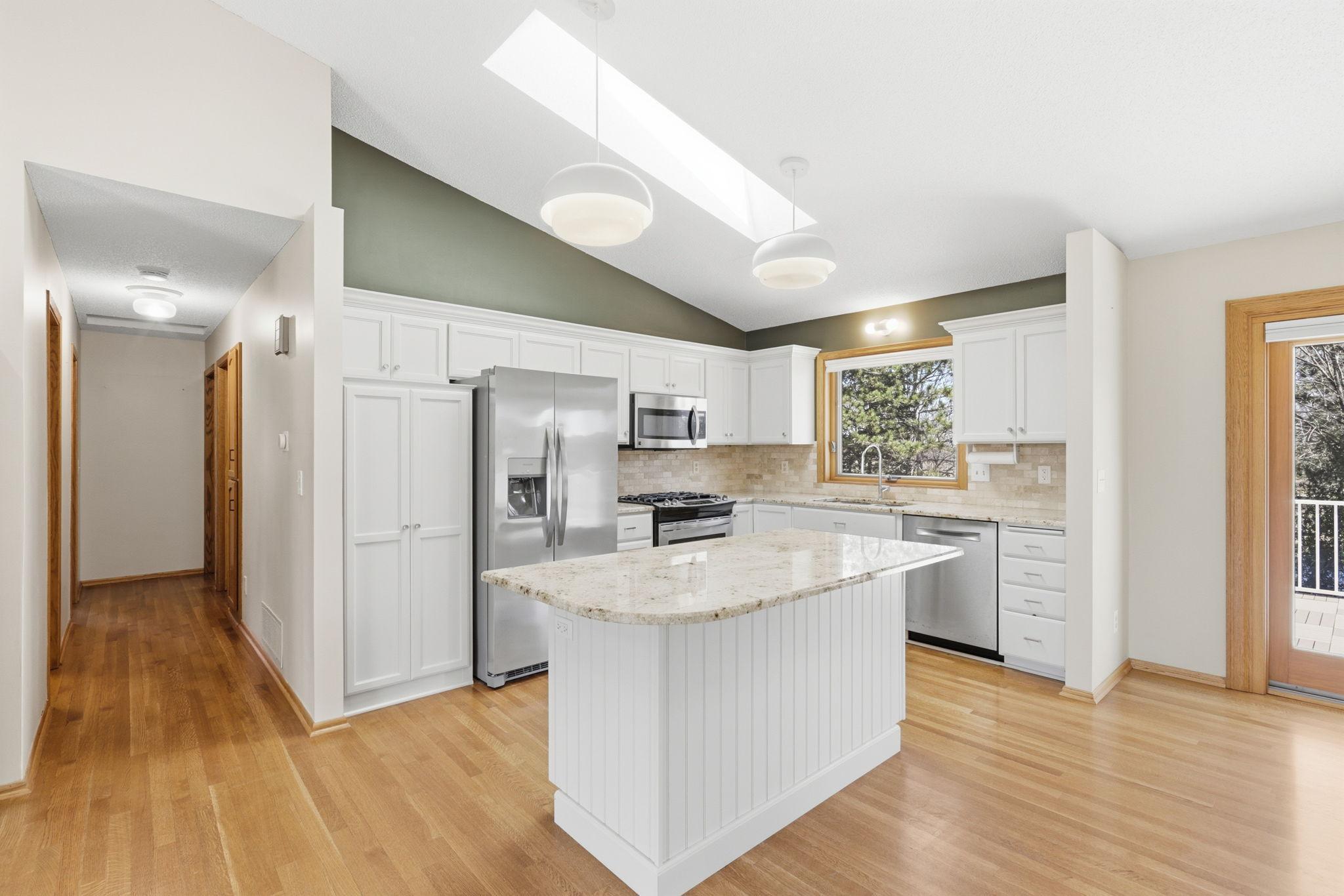 Additional seating and storage at the center island.