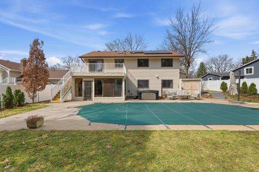 Additional half-bath accessible from the backyard.