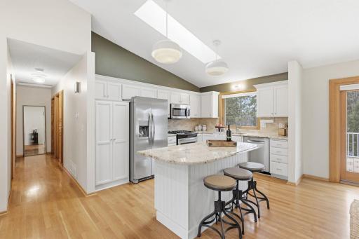 Additional seating and storage at the center island.