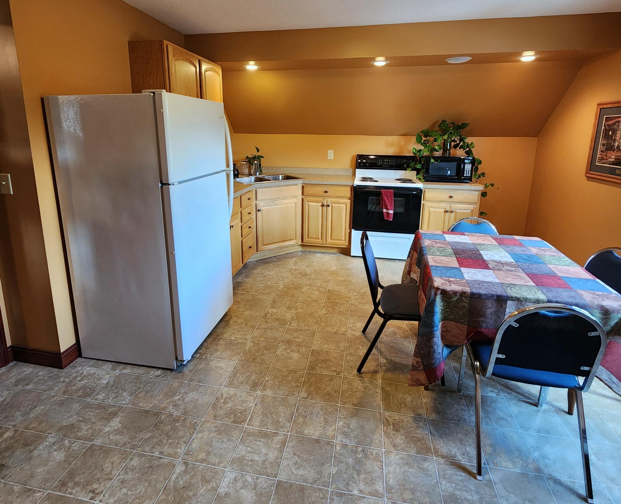 Upper Floor Kitchen that Bright and Airy plus functional.jpg