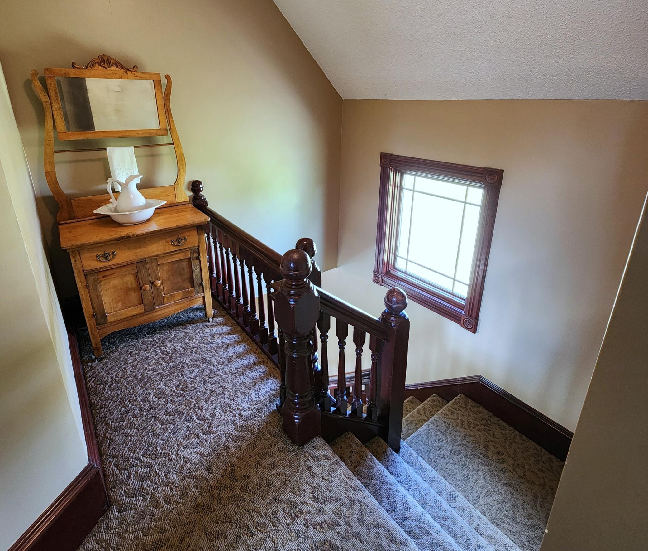 Open Staircase to Lower Level Reception Area.jpg