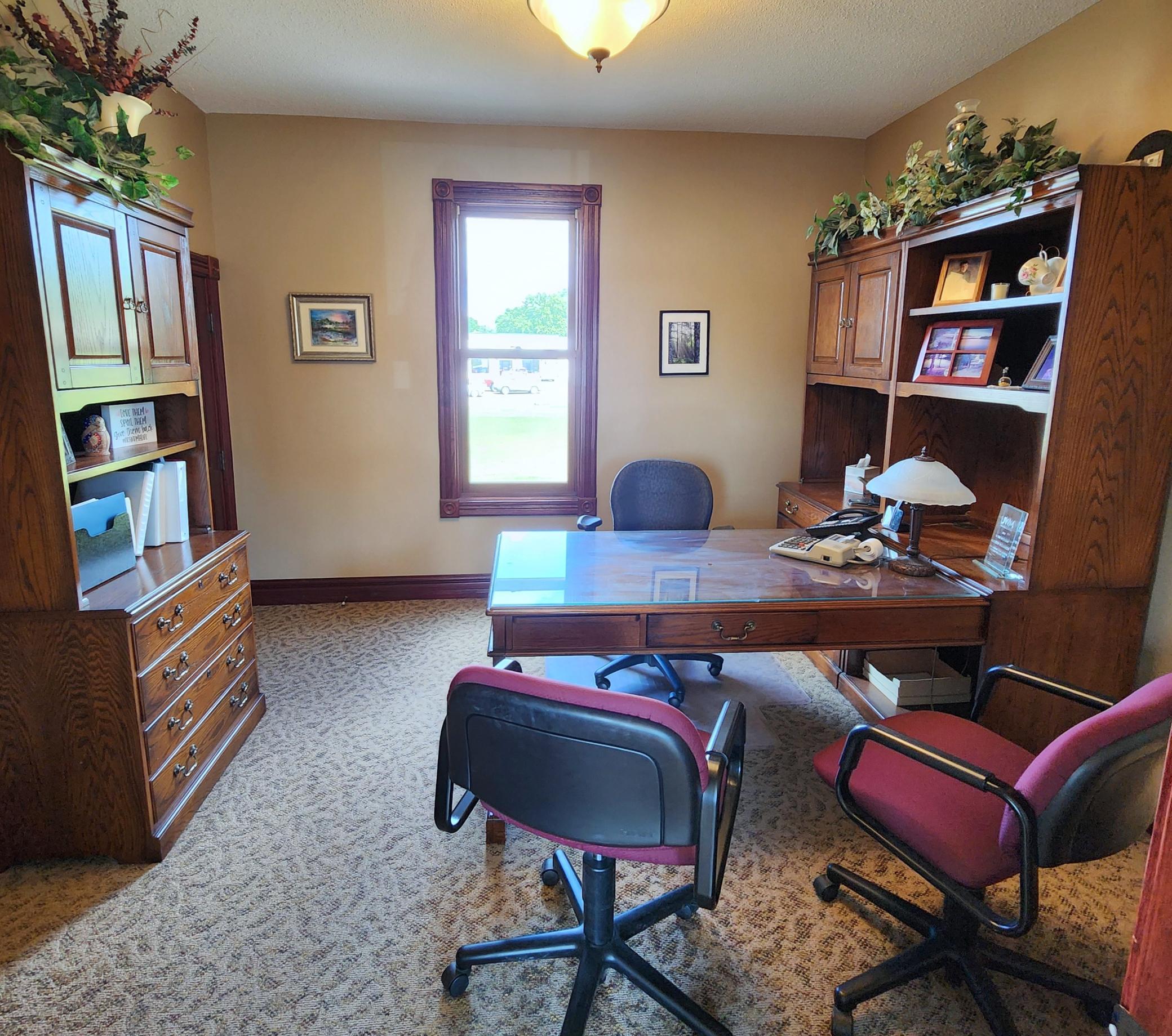 Large Main Floor Office Equipped with Speaker and Telephone Systems.jpg