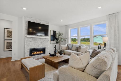 (Photo of model home, finishes will vary) Itâs shown here with an optional center fireplace to add a warm glow
