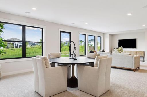 Finished lower level, gas fireplace, wet bar, athletic court