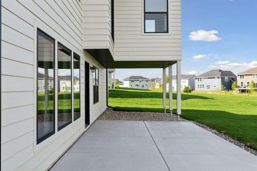 Lower level walk out to backyard and patio