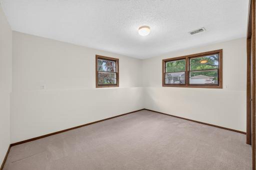 This versatile lower-level bedroom could also serve as a home office, workout room or hobby space.