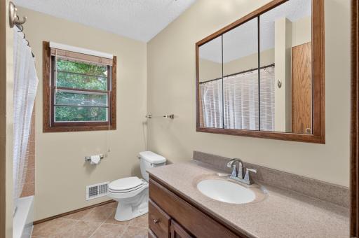 The main-level bathroom is convenient to both main-level bedrooms and all other living spaces making it ideal for guests and everyday use.
