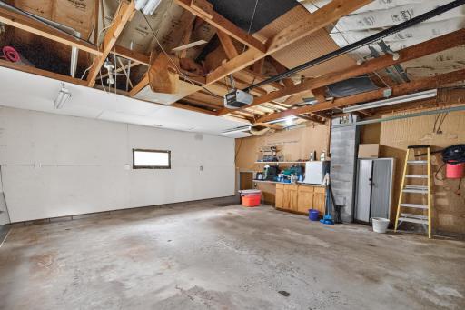 The attached garage provides convenient parking, workspace and storage.