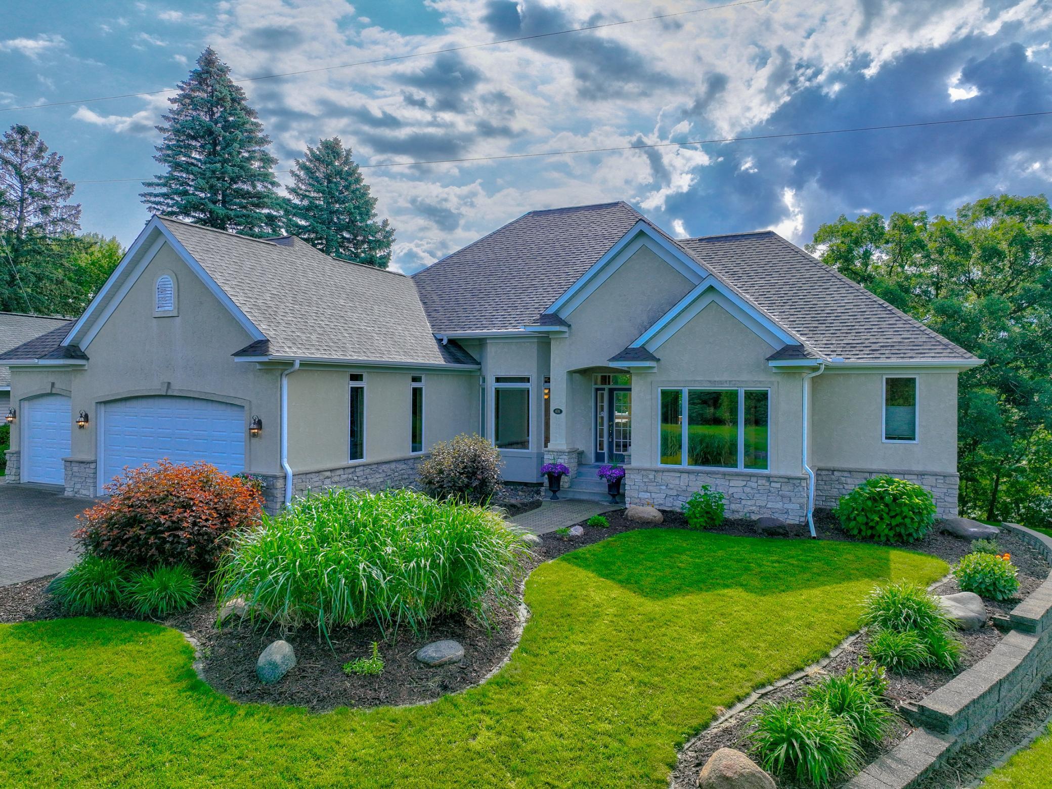 Despite the private setting, everyday conveniences are close at hand, with a grocery store just minutes away and Amery’s town center and schools within a short drive.