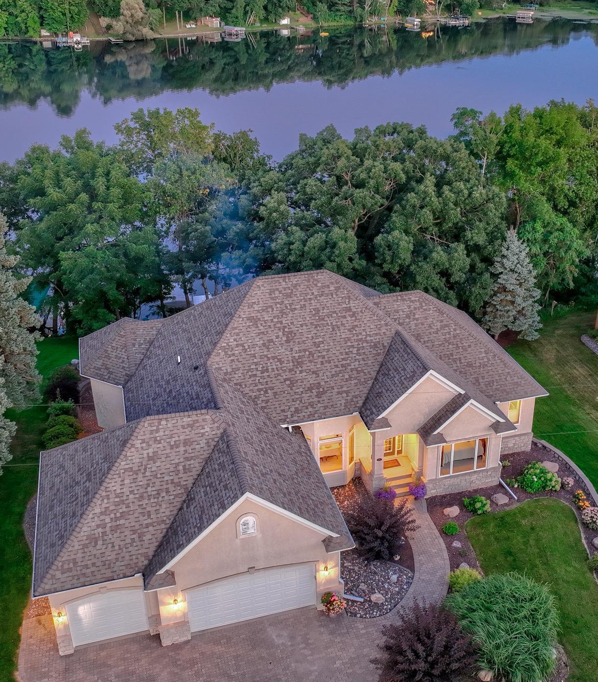 A stunning lakeside retreat on the shores of Wapogasset and Bear Trap Lake, where every season offers something to enjoy. Just one hour from the Twin Cities, this walkout rambler offers the perfect blend of peaceful seclusion and modern comfort.