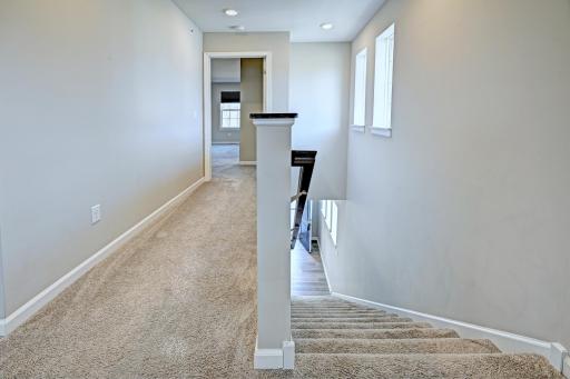 View of Stairs with Primary Bedroom at End of Hallway.jpg