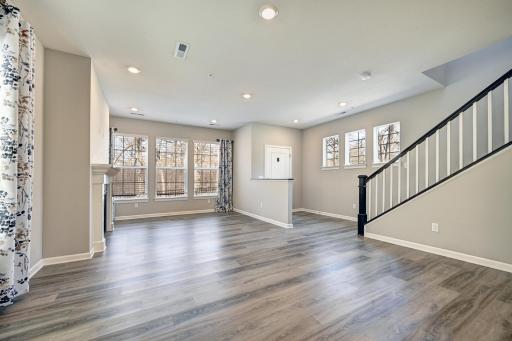 View of Living Room, Front Door from the Kitchen and Dining Room.jpg