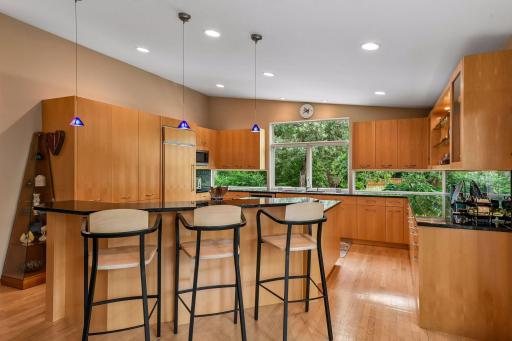 A spacious center island provides additional prep space and casual seating.