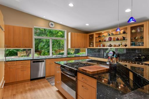 Thermador and Sub-Zero appliances complement the kitchen’s quality finishes and thoughtful design.