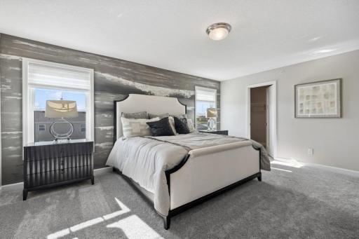 (Photo of a decorated model, actual features will vary) Find your retreat in this stunning owner's suite. Enjoy the exclusivity of a private bath and huge walk-in closet.
