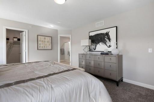 (Photo of a decorated model, actual features will vary) Another view of the spacious owner's suite.