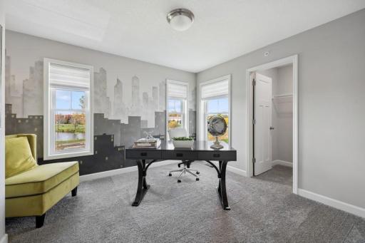 (Photo of a decorated model, actual features will vary) The other secondary bedroom can be used as an office!