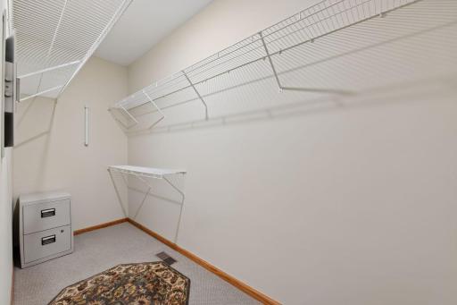 Primary bedroom walk-in closet.
