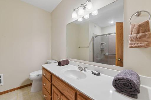 Primary bedroom private 3/4 bathroom.