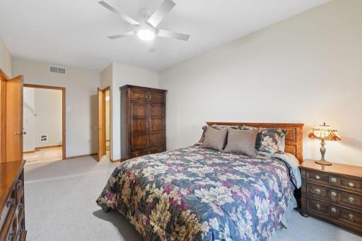 Primary bedroom with walk-in closet and ¾ bath.
