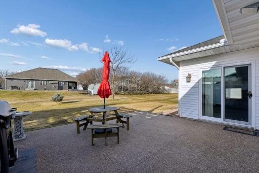 Comfortable 20’ x 16’ exposed aggregate patio.