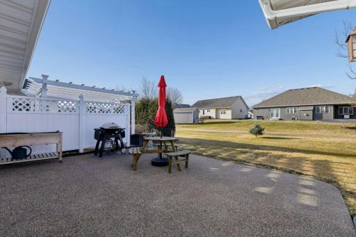 Comfortable 20’ x 16’ exposed aggregate patio.