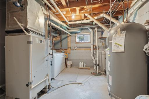 Laundry room, 84 Gallon water heater
