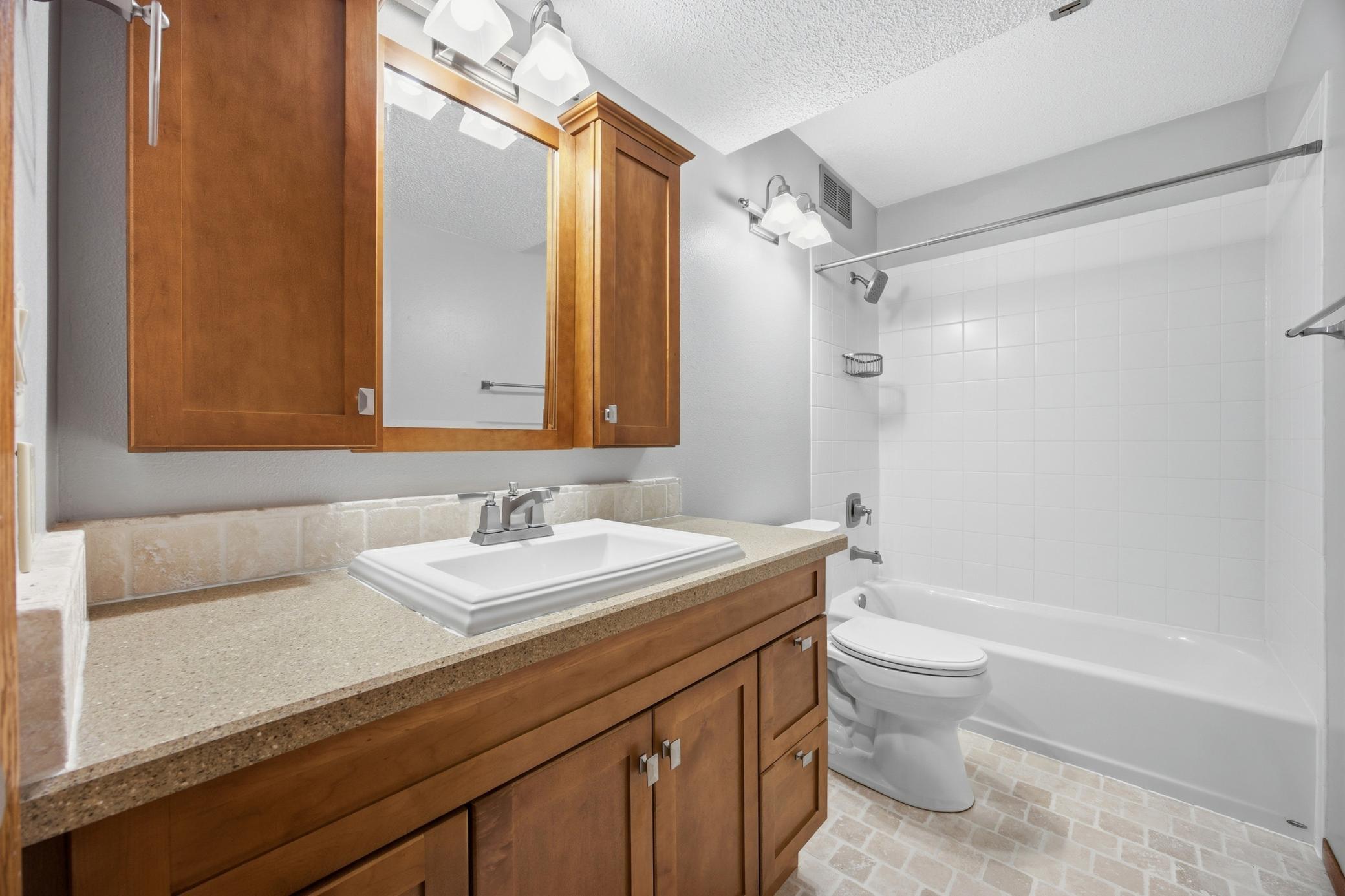 Lower Bathroom - Tile Floor & Tub Surround