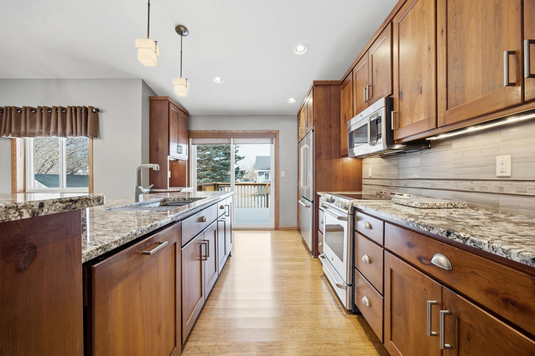 Granite Counters, Tile Backsplash, Under-cabinet Lighting