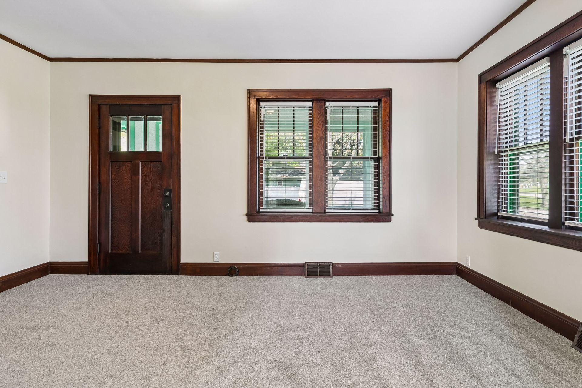 Fantastic 1925 vintage details and woodwork complement the brand new carpet and fresh paint throughout the home.