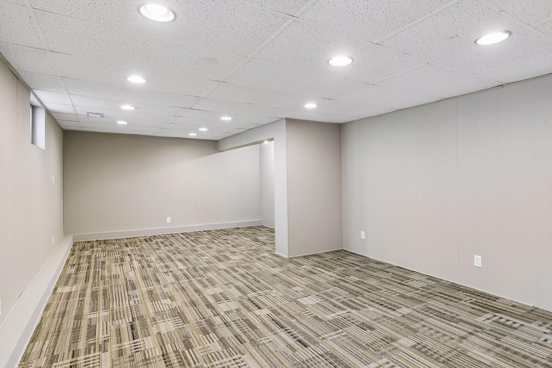 Newly finished lower level family room - tons of additional space! BRAND NEW carpet and paint.