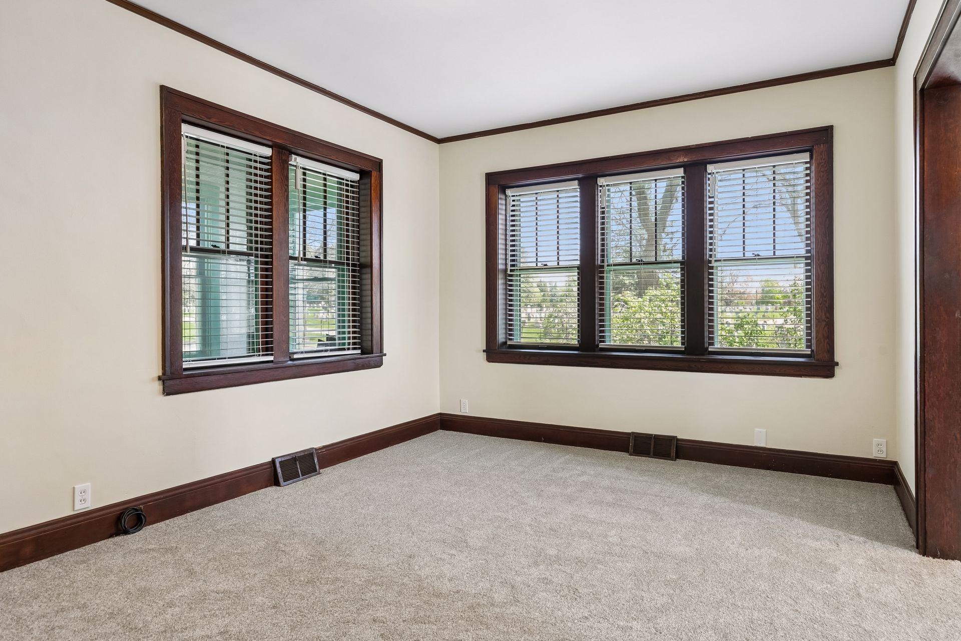 The main floor windows have custom blinds - installed in 2025: auto open and close using an app!